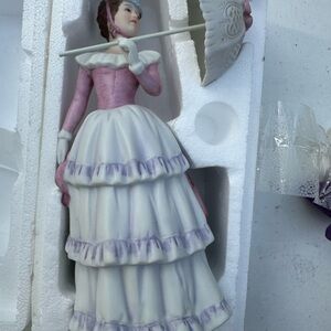 Elegant Pink and White Porcelain Figurine
